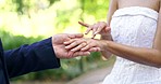 Wedding, ring and hands of couple in park for marriage ceremony, commitment and celebration. Relationship, partnership and bride and groom outdoors with jewellery for romance, trust and love symbol