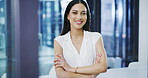 Business, happy woman and face with arms crossed in office, professional startup and management. Portrait, smile and confident female employee working in company with empowerment, happiness and pride