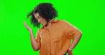 Happy, dance and woman in a studio with green screen doing a trendy moving routine for celebration. Happiness, excited and female model dancing to music or radio to celebrate by chroma key background