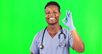 Black man, doctor and okay gesture on green screen, health with positive opinion and mockup space on studio background. Male surgeon smile, portrait and confidence in healthcare with vote and emoji