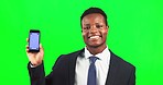 Phone, mock up and black man in studio with green screen with space for advertising or marketing. Happy, portrait and African male model with a cellphone with mockup isolated by chroma key background