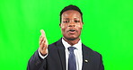 Portrait, coaching and a business black man on a green screen background in studio for a presentation. Hand gesture, training and explaining with a male employee talking during a seminar introduction