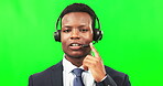 Black man, callcenter and phone call, face on green screen with communication, mockup and contact us. Headset with mic, technology and male customer service consultant, talking on studio background