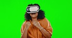 Green screen, fight and woman with virtual reality glasses, metaverse and fitness against a studio background. Female fighter, boxer and person with vr eyewear, gamer boxing and digital experience