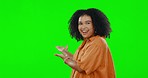 Face, green screen and woman showing, excited and happiness against a studio background. Portrait, female person and model with smile, branding development and product placement with joy and cheerful
