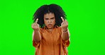 Face, green screen and woman with middle fingers, angry and rebel against a studio background. Portrait, female and upset person with anger, frustrated and rude hand gesture with conflict and opinion