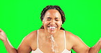 Water splash, green screen and smile of woman, face and beauty in studio for natural skincare. Happy female model, wet facial and cleaning for hygiene, hydration or washing for wellness on background