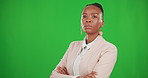 Business woman, portrait and serious on green screen with arms crossed for pride and mockup. Face of professional, young and African entrepreneur person, CEO or boss angry on a studio background