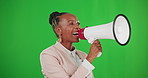 Shout, attention and black woman with megaphone on green screen in studio isolated on a background. Protest, screaming and happy person on loudspeaker for announcement, change or speech for justice.