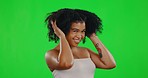 Hair shake, green screen and face of woman with smile for beauty, wellness and self care in studio. Luxury salon, satisfaction and portrait of girl with afro hairstyle for cosmetics, texture and glow