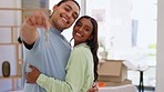 House, keys and face of happy couple kiss in home, real estate and property loan of relocation. Portrait of man, woman and partner celebrating moving in together, building mortgage and investment 