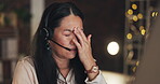 Stress, burnout or Asian woman in call center with headache feeling overworked in crm communications. Fatigue, tired or telemarketing sales agent with anxiety or bad migraine pain problem at night 