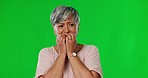 Green screen, bite nails and senior woman with scared, fear and worry expression in studio. Stress, mental health mockup and face of elderly female with nervous, phobia and worried emoji in studio