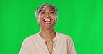 Happy, smile and laugh with woman on green screen for natural, confidence and pride. Funny, happinesses and relax with portrait of senior female on studio background for funny, comedy and carefree