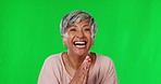 Senior woman, celebration and green screen studio with excited face for secret win, surprise or achievement. Indian female, applause and wow in portrait with happiness for goal, winning and mock up
