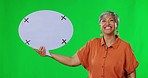 Speech bubble, green screen and tracking marker by senior with happy face on studio background. Portrait, poster and elderly lady smile with mockup, banner and social media, news or announcement 