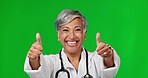 Green screen, excited doctor and woman with thumbs up for agreement, thank you and good news in studio. Healthcare, emoji mockup and portrait of happy lady for medical support, wellness and insurance