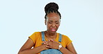 Black woman, hands on chest and heartburn pain, indigestion and cardiovascular health problem on studio background. Medical emergency, female with anxiety or stress, heart attack or panic with mockup