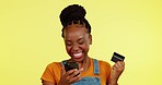 Black woman, smartphone and credit card, yes and dance, success in payment and ecommerce on yellow studio background. Online shopping, female happy about sale or discount, excited dancing and mockup