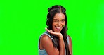 Happy wink, gen z face and green screen portrait of a woman in studio background with fashion aesthetic. Young female, smile and happiness of model feeling youth and stylish with trendy hairstyle