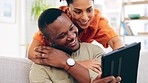 Couple, tablet and smile with hug on sofa in home living room, online browsing or web scrolling. Interracial, technology and happy black man and woman bonding on couch in lounge on social media.