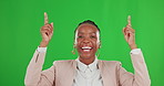 Happy, black woman and pointing up on green screen, studio and mockup background. Portrait of female worker advertising business promotion, product placement and showing offer of deal coming soon 