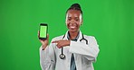 Doctor portrait, green screen or black woman with phone for marketing, advertising or product placement. Happy, digital or African girl on mockup space for healthcare clinic logo or information data