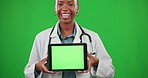 Face, doctor and black woman with tablet, green screen and telehealth against studio background. Portrait, African American female employee and medical professional with device, mockup and healthcare
