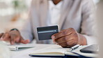 Black man, hands and credit card typing in ecommerce, online shopping or purchase at office desk. Hand of happy African American businessman in electronic transaction or internet banking at workplace