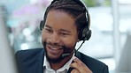 Call center, black man and happy while talking and typing on computer for crm, telemarketing or online help. Businessman, customer support and African guy agent consulting for contact us with a smile