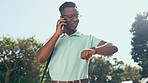 Phone call, time and business black man in city waiting for lift, taxi service and transport to workplace. Communication, discussion and male worker check watch for planning, schedule and commute