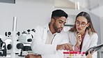 Science, talking and doctors with research sample of dna, blood or chemistry for medical innovation. Teamwork, lab and man and woman giving advice on notes for pharmaceutical development and medicine