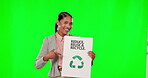 Green screen, recycle and woman face isolated on studio background sustainability, recycling or eco friendly poster. Biracial business person point to cardboard sign of clean planet or climate change