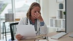 Asian woman, doctor and reading document with headache in burnout, stress or strain at office desk. Tired medical female professional suffering from head pain, fatigue or healthcare report at clinic