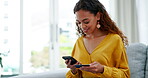 Happy woman, phone and credit card on sofa for online shopping, ecommerce or purchase at home. Female shopper relaxing and smile in living room on smartphone app for electronic transaction or banking