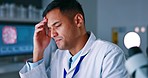 Stress, anxiety and man with headache in laboratory, tired and exhausted scientist working overtime. Mental health, burnout and science, frustrated doctor in lab with hand on head for pain or massage