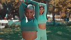 Women, friends and fitness in nature with stretching and exercise, training outdoor with healthy and active lifestyle. Motivation, support and female workout together with sports and warm up in park