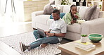 Laptop, phone and couple relax with technology, scroll and usertyping website, internet or web search for home online shopping. Weekend free time, love and people reading on home living room couch