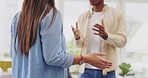 Argument, conflict and couple talking in the living room for divorce, cheating or toxic problem. Angry, disagreement and young man and woman fighting for breakup or affair in their home or apartment.