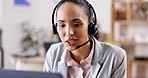 Woman at callcenter with phone call, talking and contact us, communication and headset with mic and help desk worker. CRM, customer service and female consultant with laptop, conversation and telecom