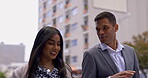 Collaboration, walking and a business team in the city on their morning commute into work for the day. Teamwork, diversity or planning with a man and woman employee taking a walk in an urban town