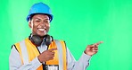 Construction worker, black man with smile, pointing and green screen, marketing and product placement. Mockup, branding and happy male in portrait with contractor business advertising and logo promo