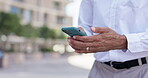 Businessman, hands and phone typing in city for communication, social media or networking outdoors. Hand of employee man chatting or texting on mobile smartphone for business proposal in a urban town