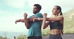 Fitness, outdoor and couple stretching, training and workout together for wellness, healthy lifestyle and body care. Partners, man and woman exercise outside, stretch arms and warm up for balance