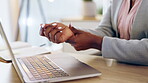 Laptop, hands and osteoporosis with a business person closeup, working alone in the office from above. Computer, wrist and carpal tunnel with a professional or corporate employee suffering an injury