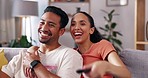 Watching tv, remote or relax home couple watch content video, streaming subscription movie and bonding. Love, cozy and happy romantic man, woman or people talking about television show on lounge sofa