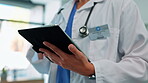 Medical, doctor and tablet in hands for healthcare, medicine and health insurance research. Male worker in a hospital for internet search, professional care and telehealth advice on wellness app