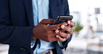 Black man, hands and phone typing in communication, social media or business idea and strategy at office. Hand of African American businessman texting or chatting on mobile smartphone for networking