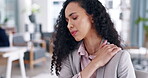 Stress, shoulder pain and business woman massaging her joint while working at a desk in the office. Health, inflammation and injury with an uncomfortable female employee rubbing a sore muscle at work