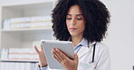 Serious, doctor and tablet with woman in hospital for research, website or digital results. Healthcare, medicine and technology with female reading information for test report, internet or connection